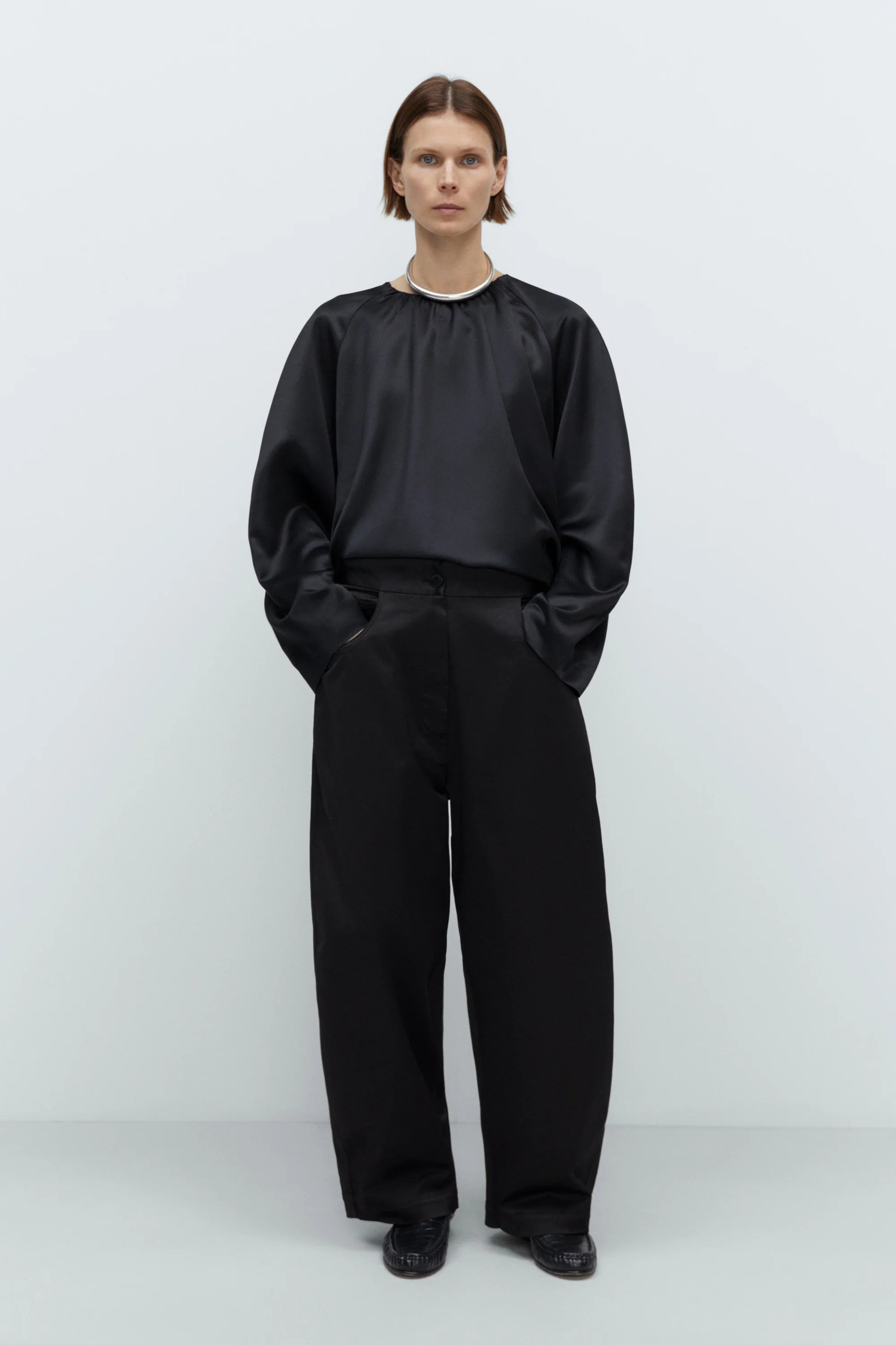 Pantaloni "Satin Curved"