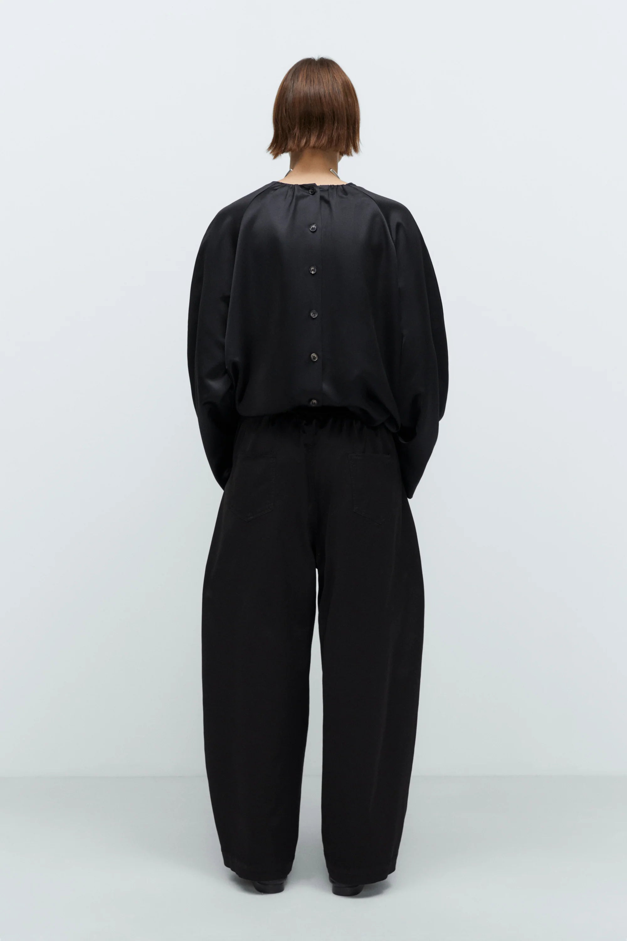 Pantaloni "Satin Curved"